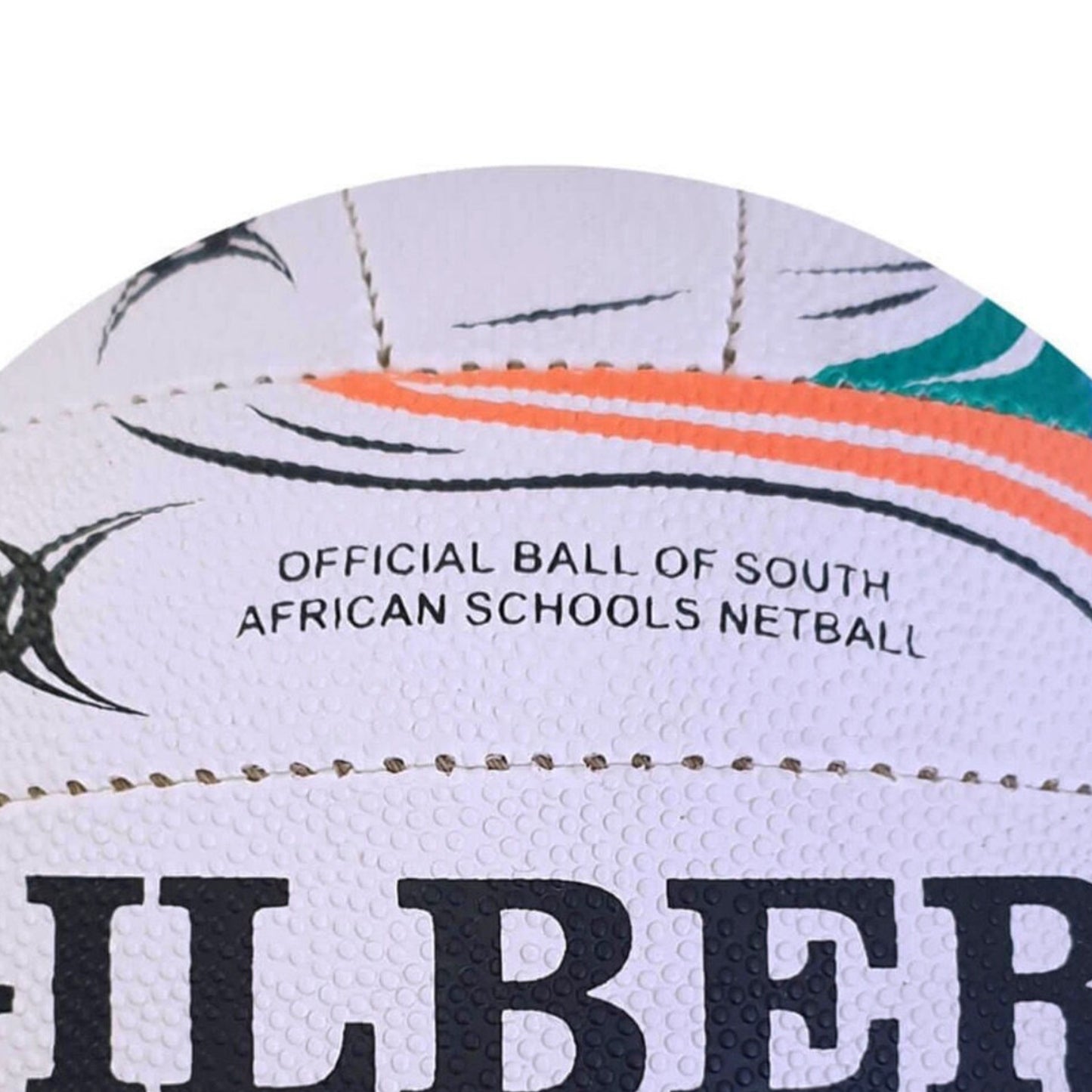 Close-up of a netball with 'Official Ball of South African Schools Netball' text. On a white brackground