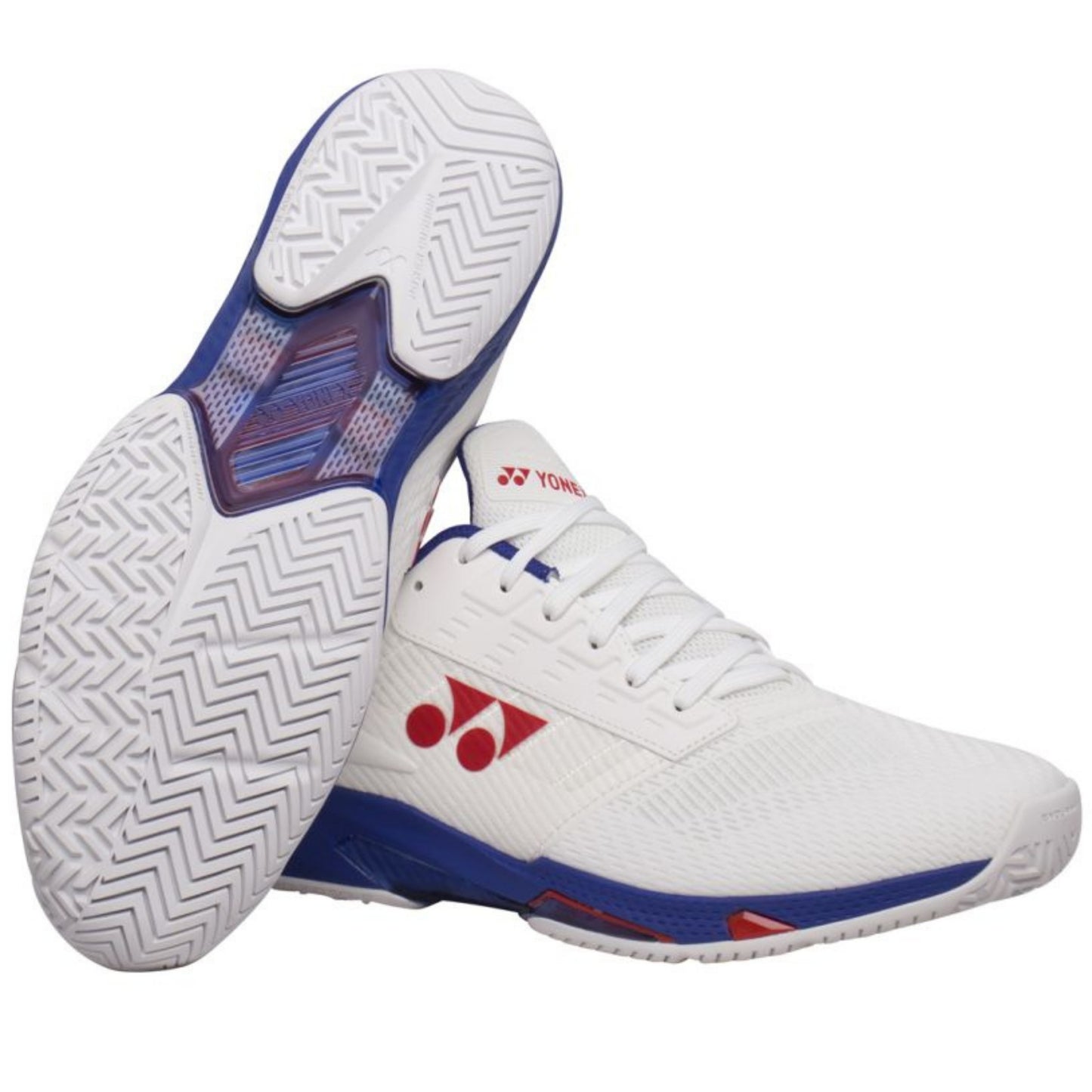 White tennis shoe with red and blue accents on a white background