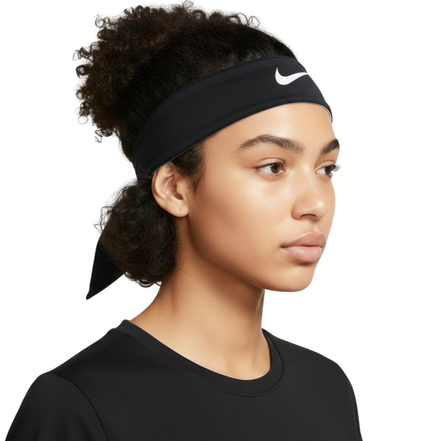 Person wearing a black Nike headband on a white background