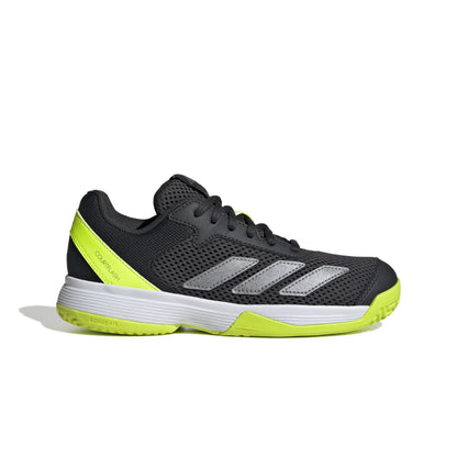 Black and yellow Adidas shoe on a white background