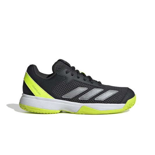 Black and yellow Adidas shoe on a white background