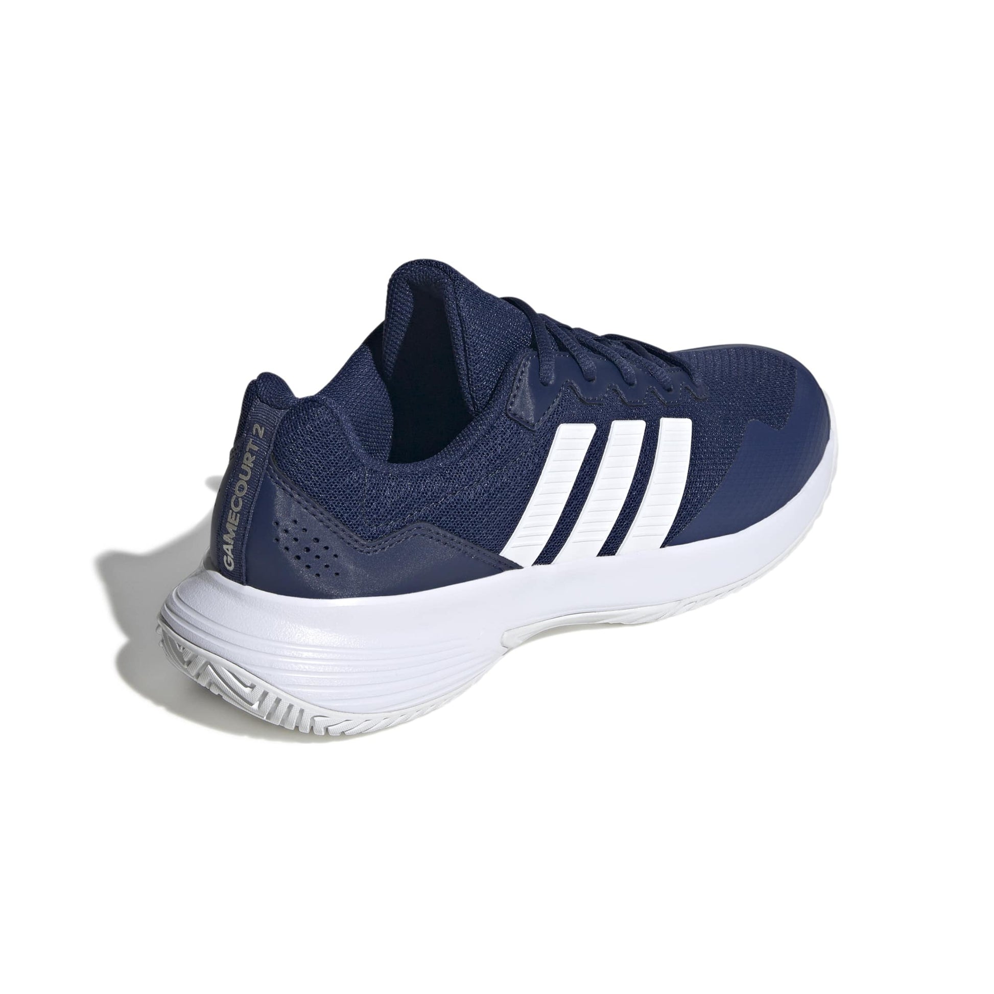 Navy blue tennis shoe with white stripes on a white background