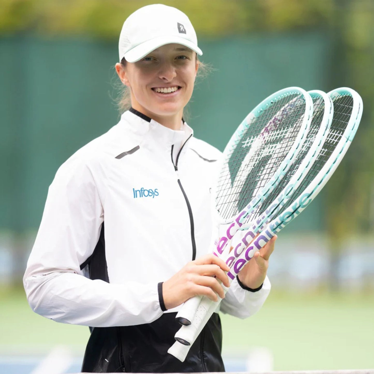 Tennis player holding a racket on a tennis court