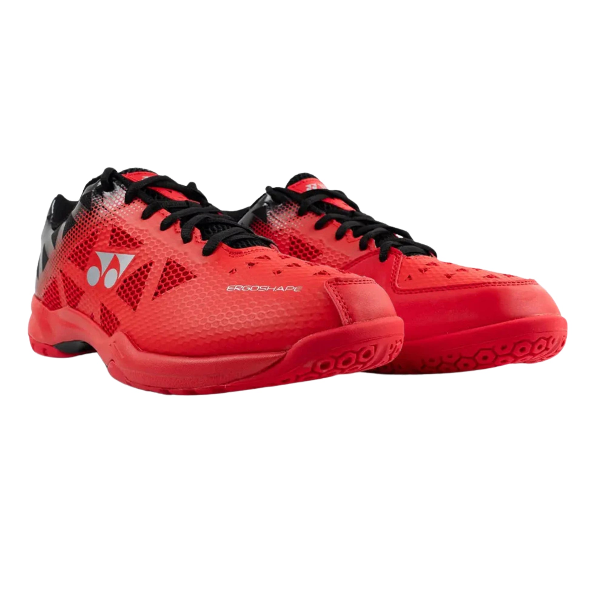 Red athletic shoes with black accents on a white background