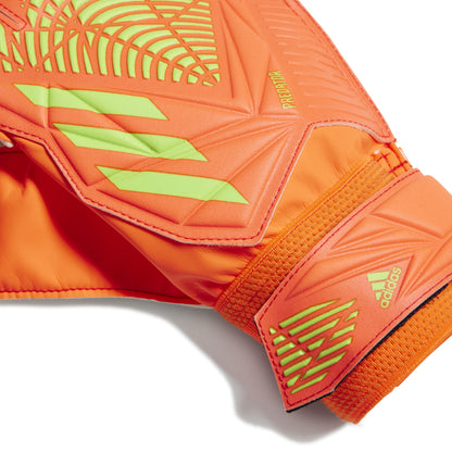 Close-up of orange and green sports equipment with Adidas logo