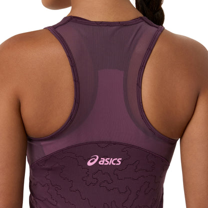Rear view of a woman wearing an ASICS athletic dress in a deep plum purple color, featuring a pink ASICS logo on the lower back.