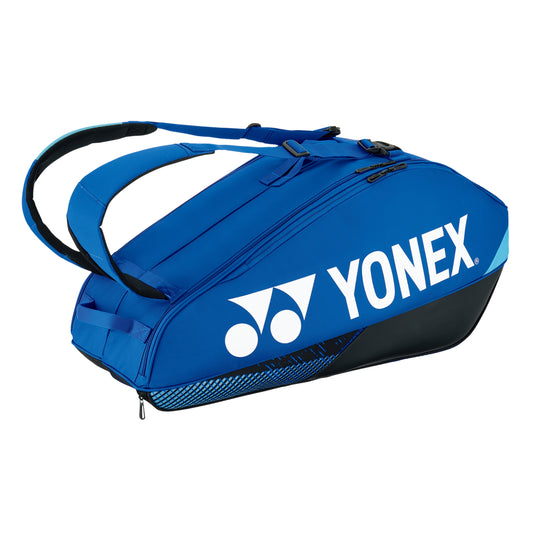 Blue Yonex tennis bag on a white background