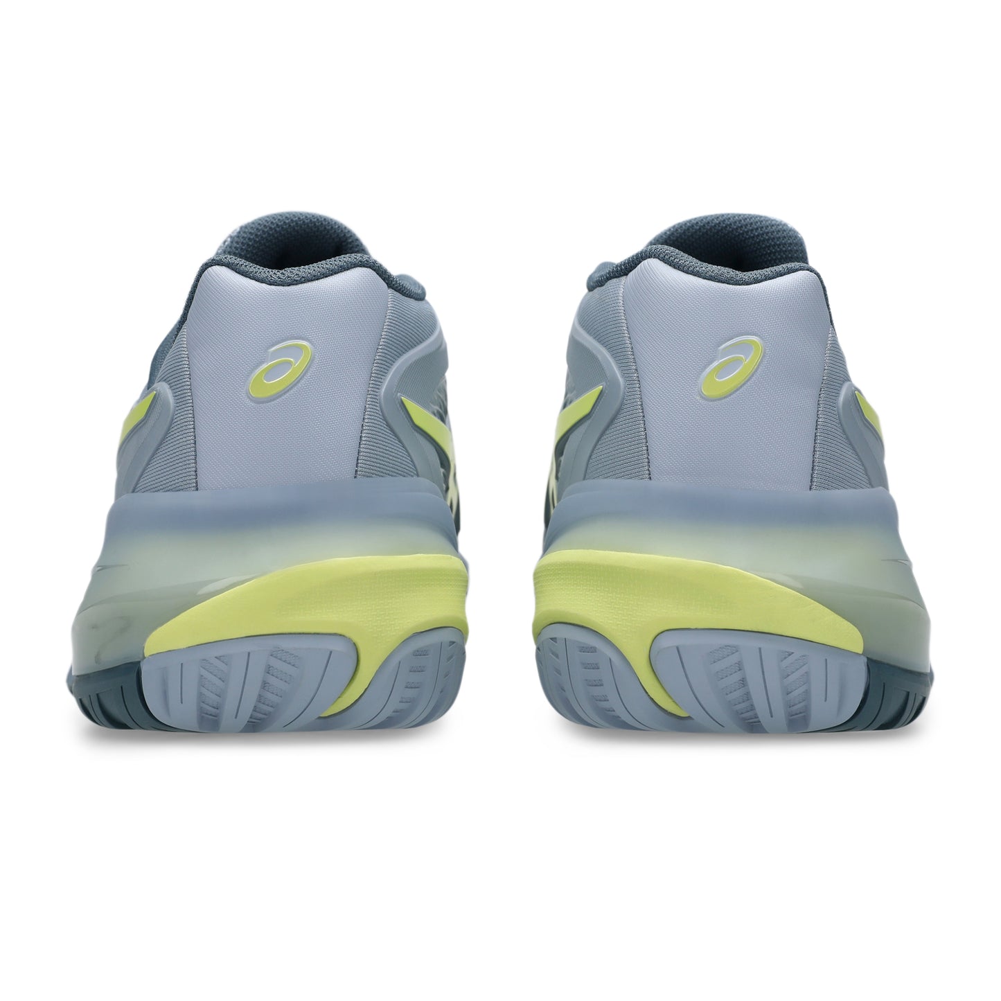 Gray and yellow tennis shoes on a white background