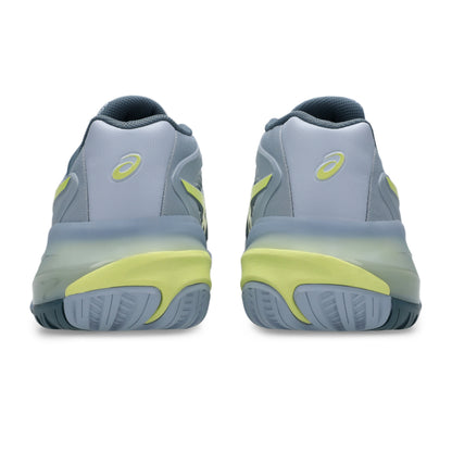 Gray and yellow tennis shoes on a white background