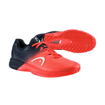 Red Head tennis shoes with black accents with a bottom shoe sole on a white background