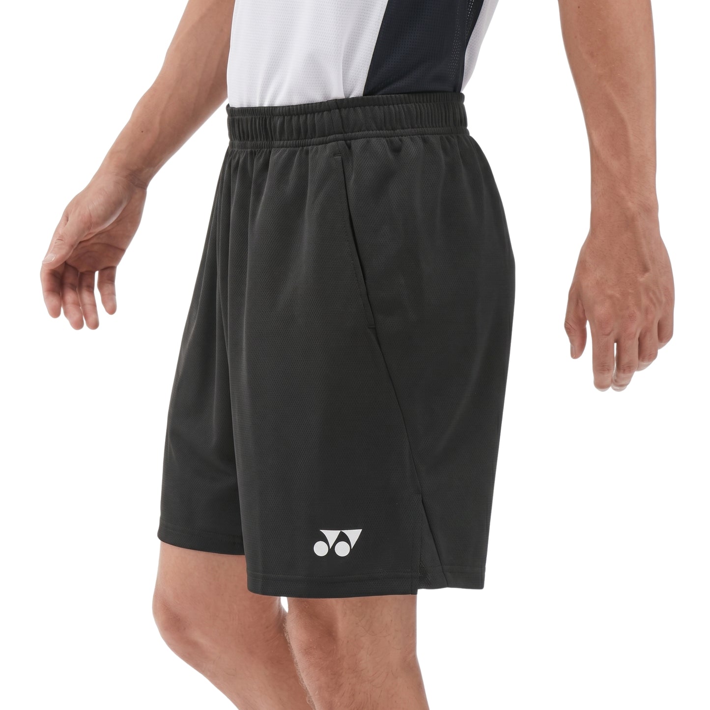 Black Yonex shorts with a logo on a white background