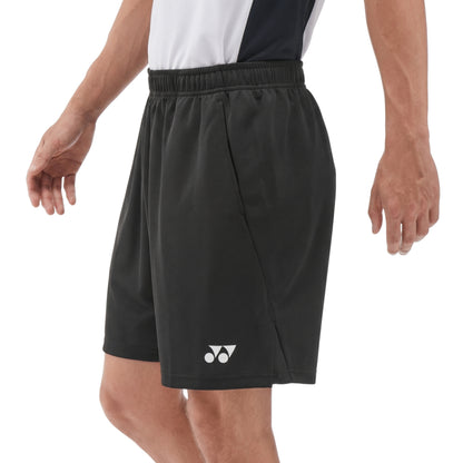 Black Yonex shorts with a logo on a white background