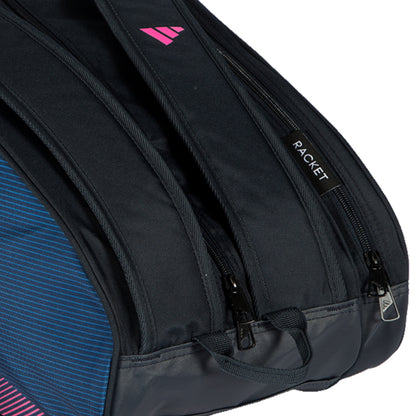 Close-up of a black adidas bag with a pink logo and 'Racket' branding.