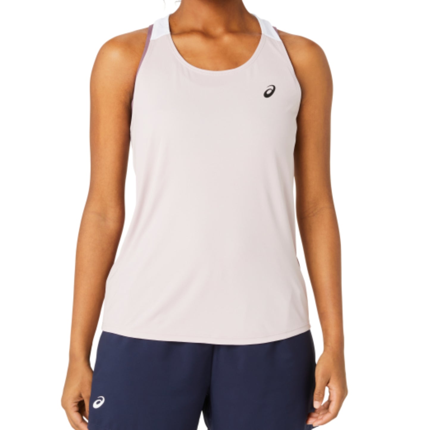 Person wearing a light rose Asics tank top with a visible brand logo on a white background