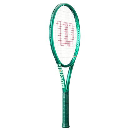 Green Wilson tennis racket with a white strings background on a white background