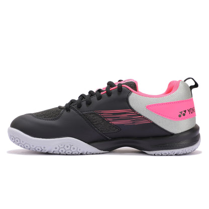 Black and pink Yonex squash shoe on a white background