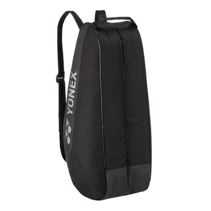 Black Yonex tennis bag on a white background