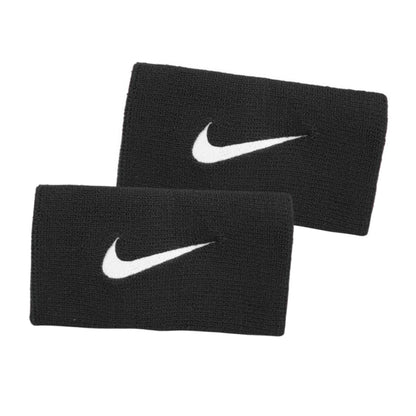 Two black wristbands with white Nike logos on a white background