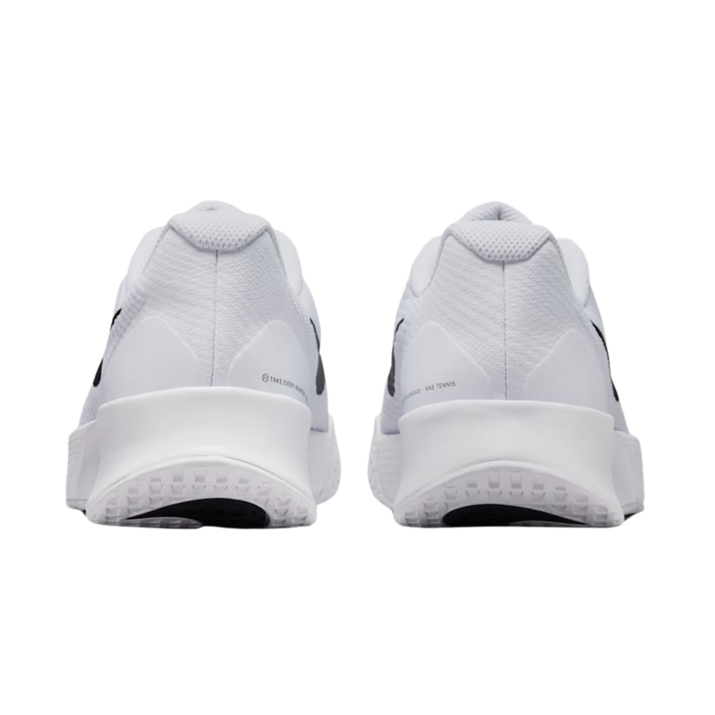 White tennis shoes with black accents on a white background