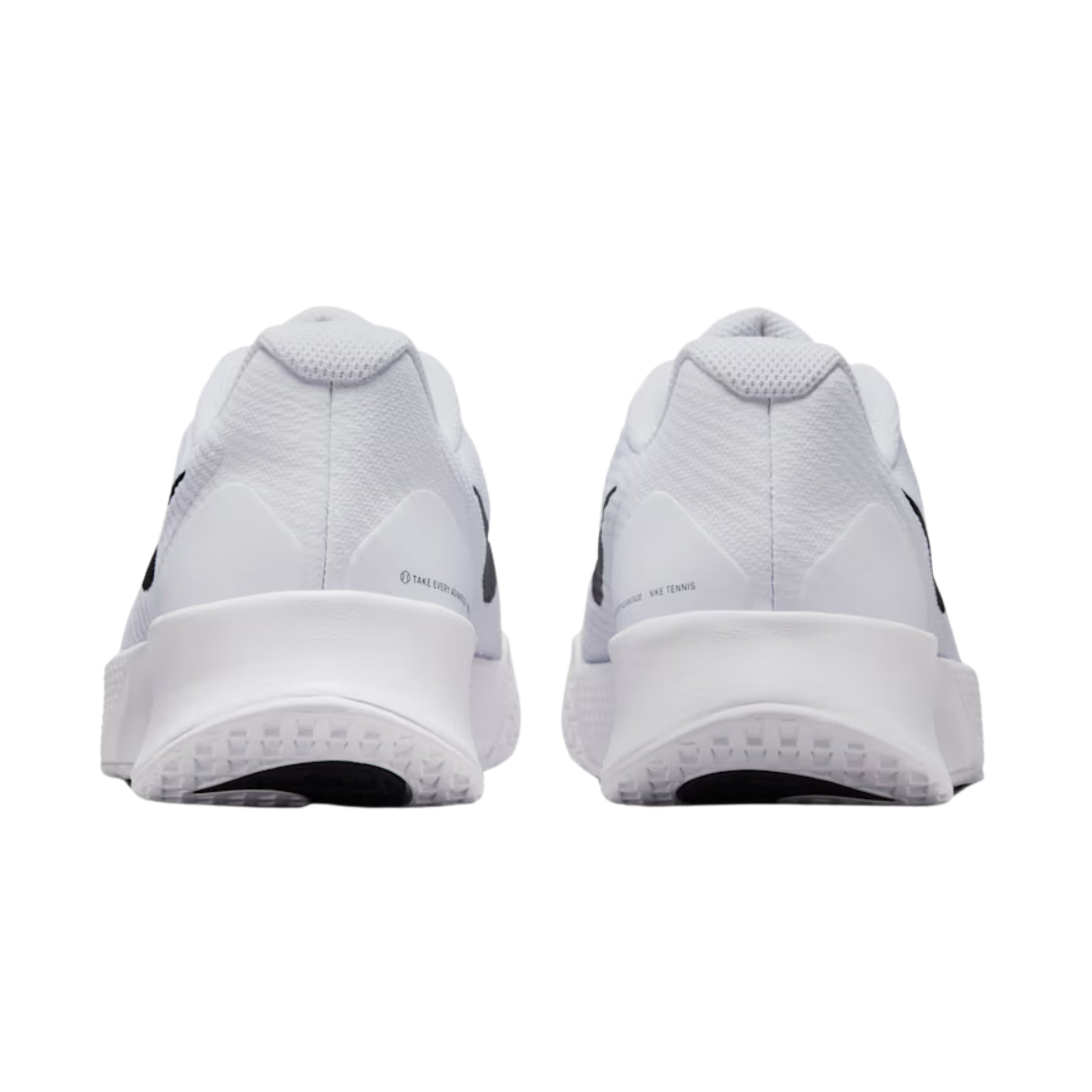 White tennis shoes with black accents on a white background