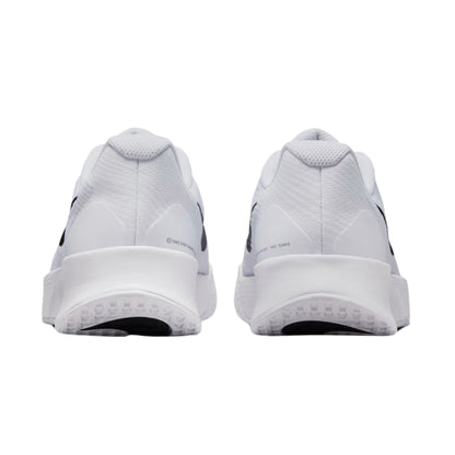 White tennis shoes with black accents on a white background