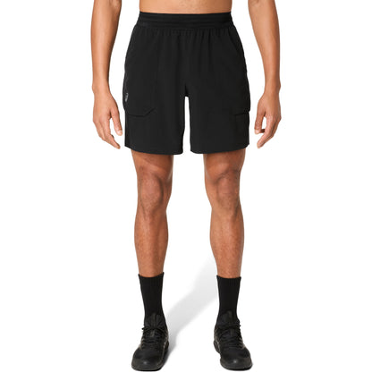 Man wearing black shorts on a white background