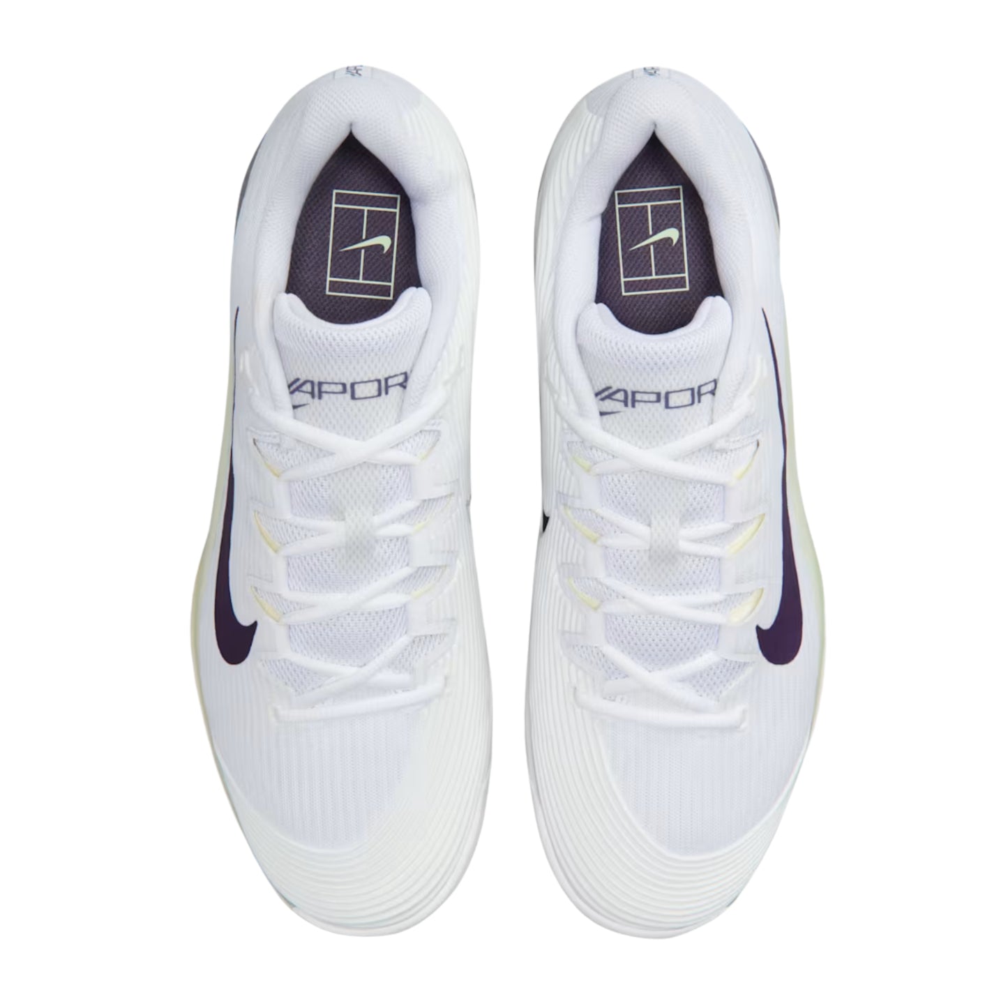 White tennis shoes with navy accents on a white background