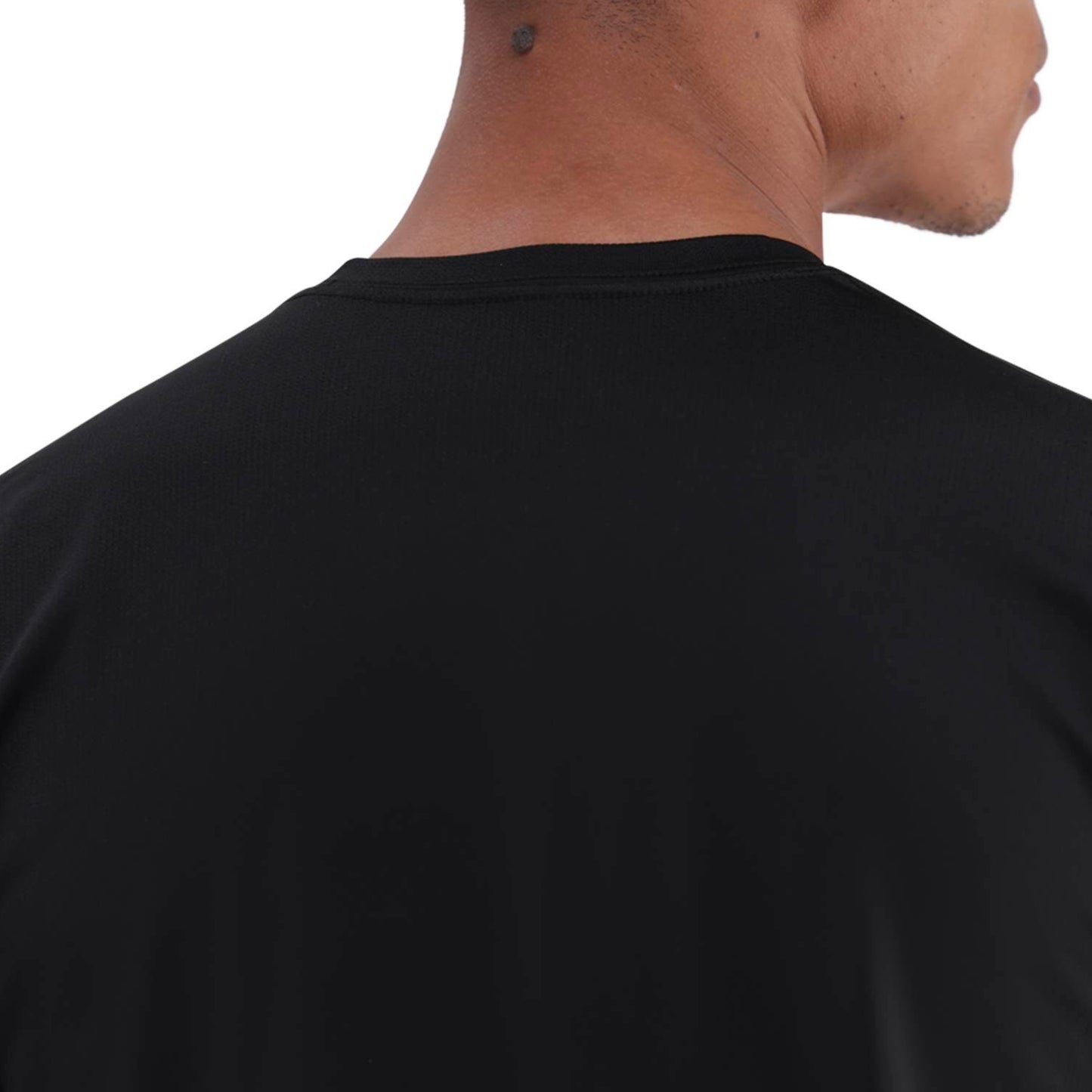Black t-shirt worn by a person on a white background
