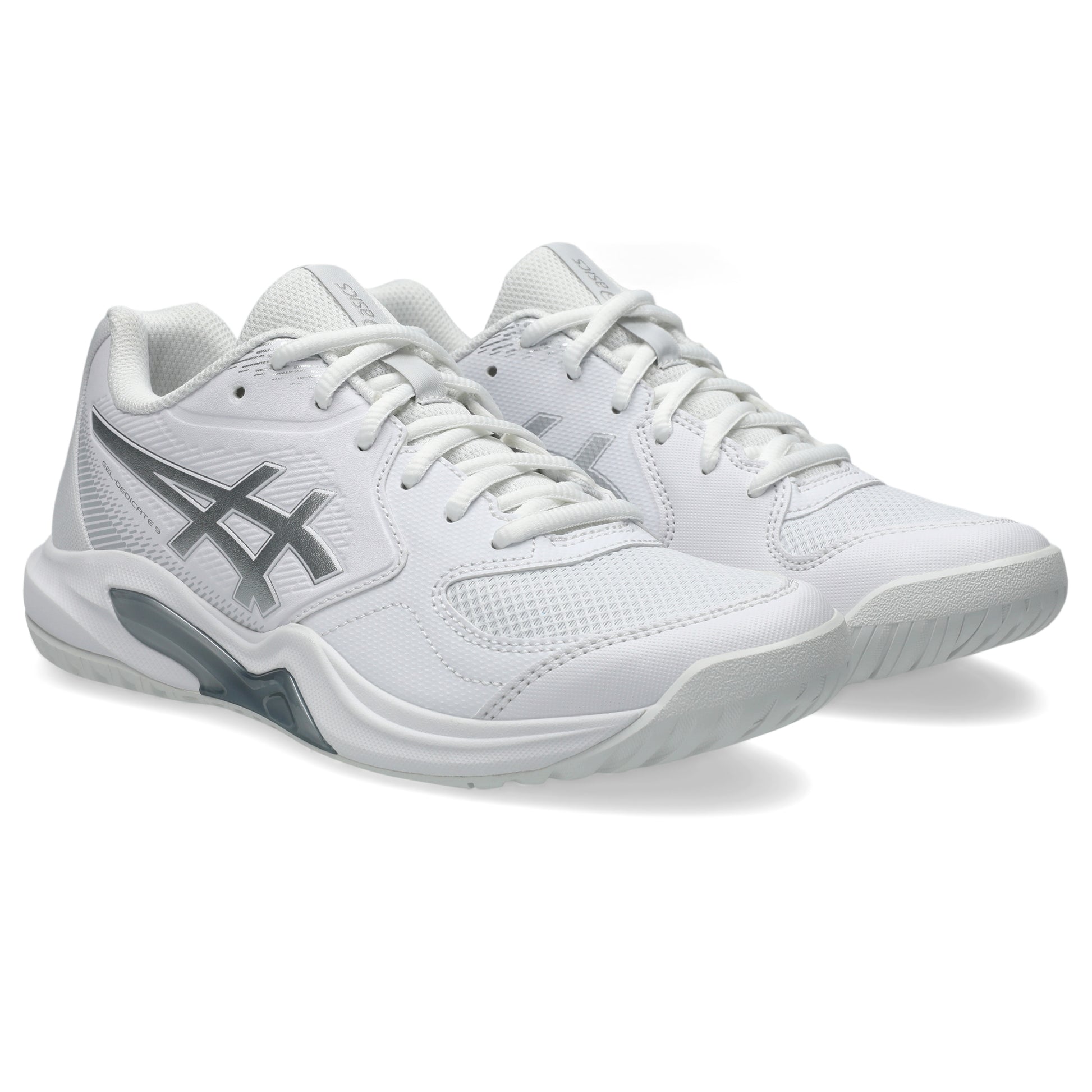 A pair of white tennis shoes with gray accents and white laces, shown from a three-quarters angle on a white background.