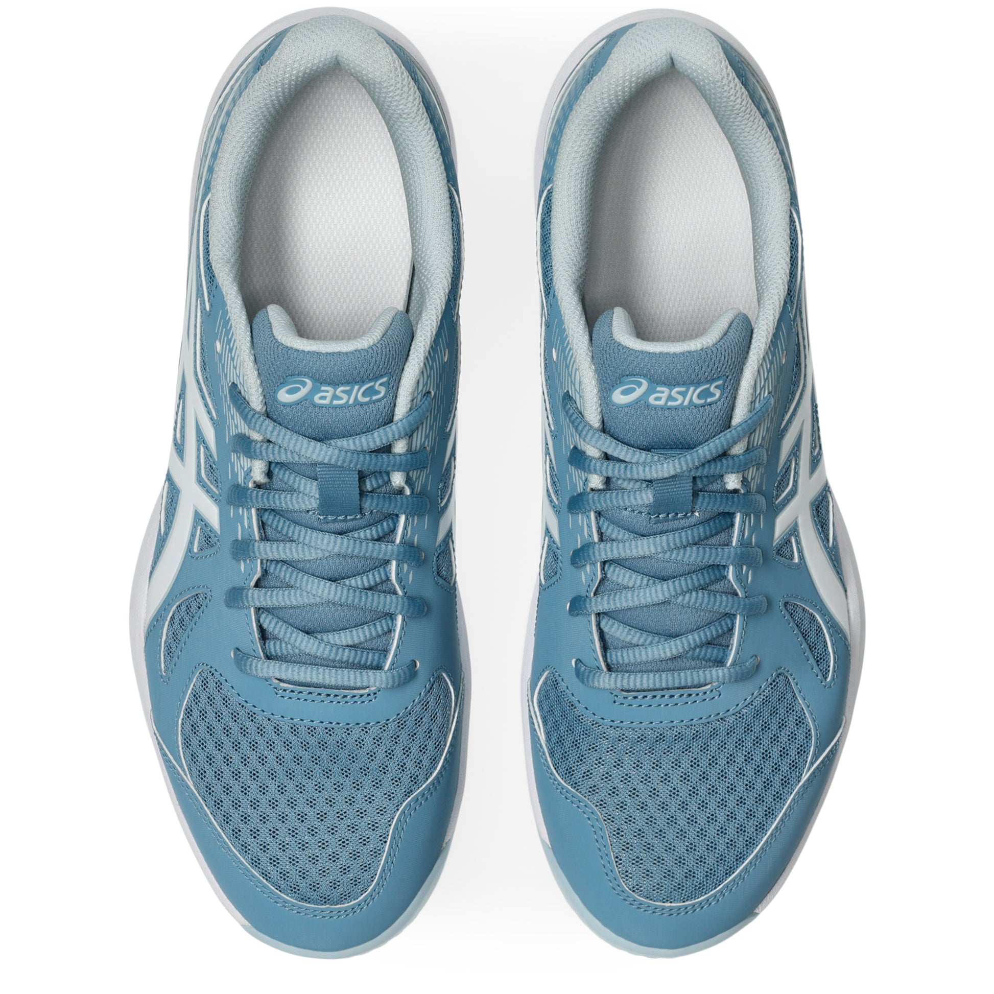 Pair of blue Asics squash shoes on a white background