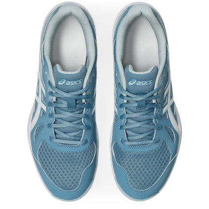 Pair of blue Asics squash shoes on a white background