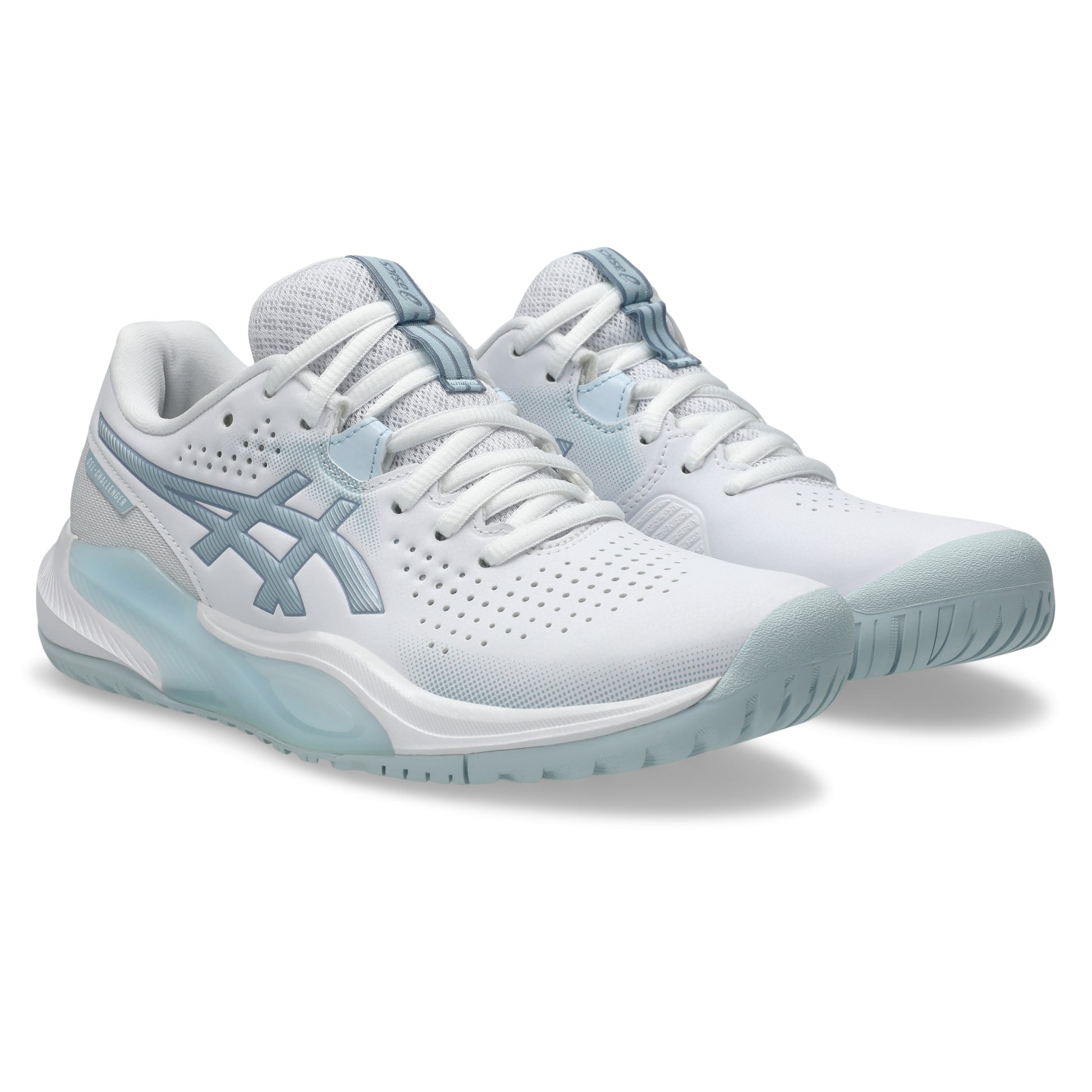 White and light blue tennis shoes on a white background