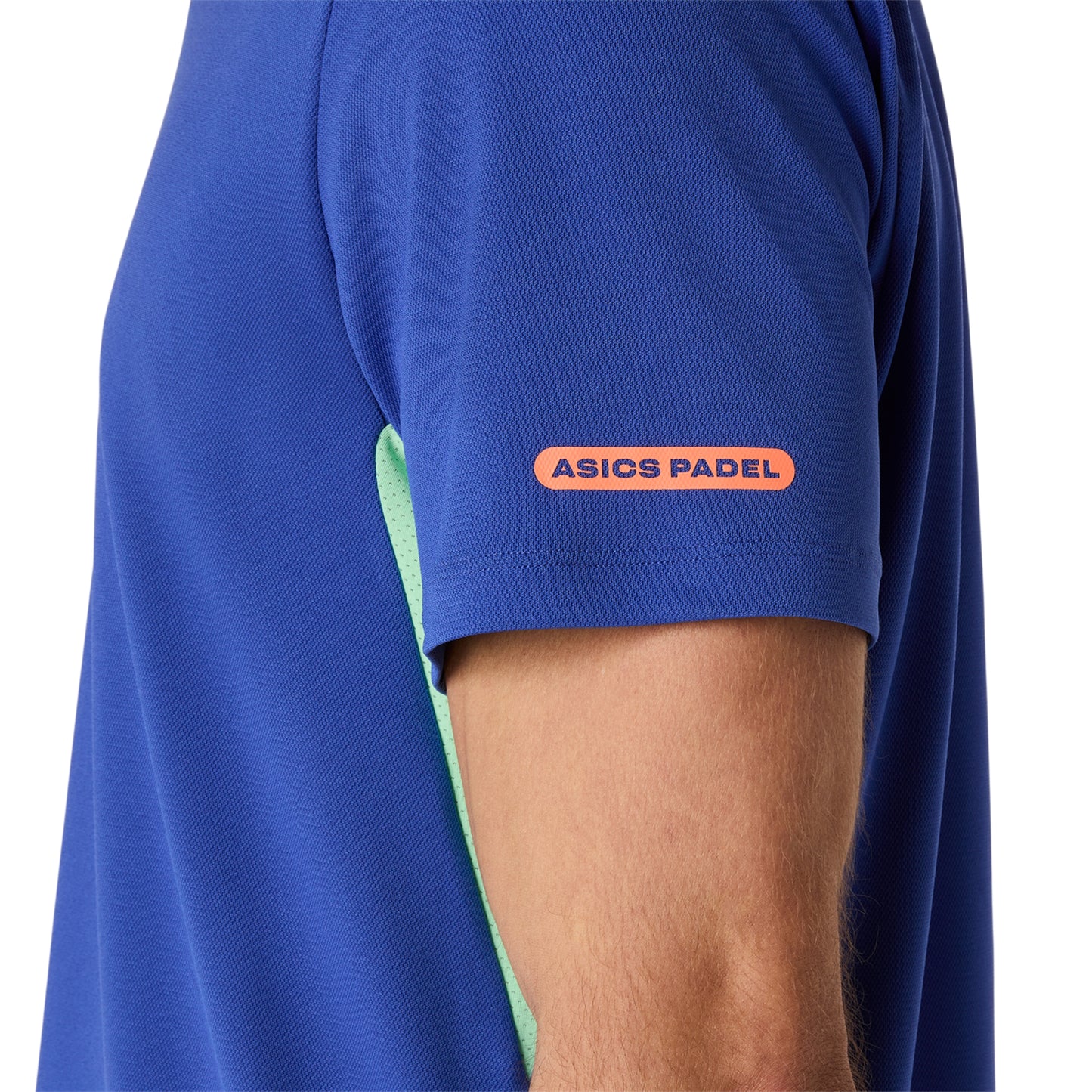 Blue shirt with Asics Padel logo on a white background