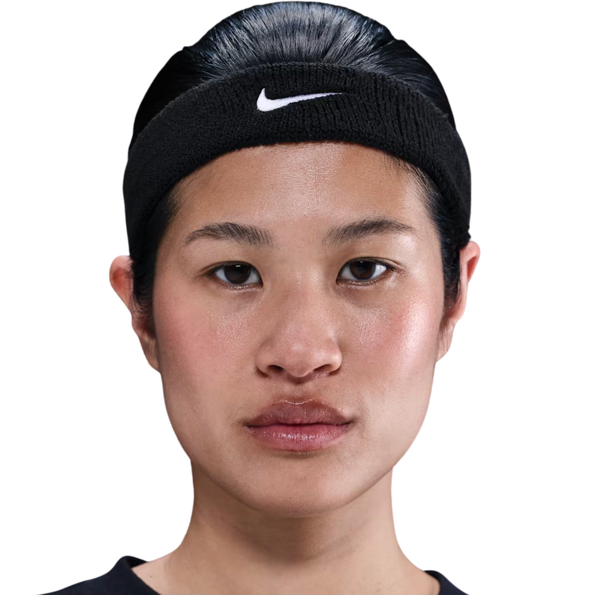 Person wearing a black Nike headband on a white background