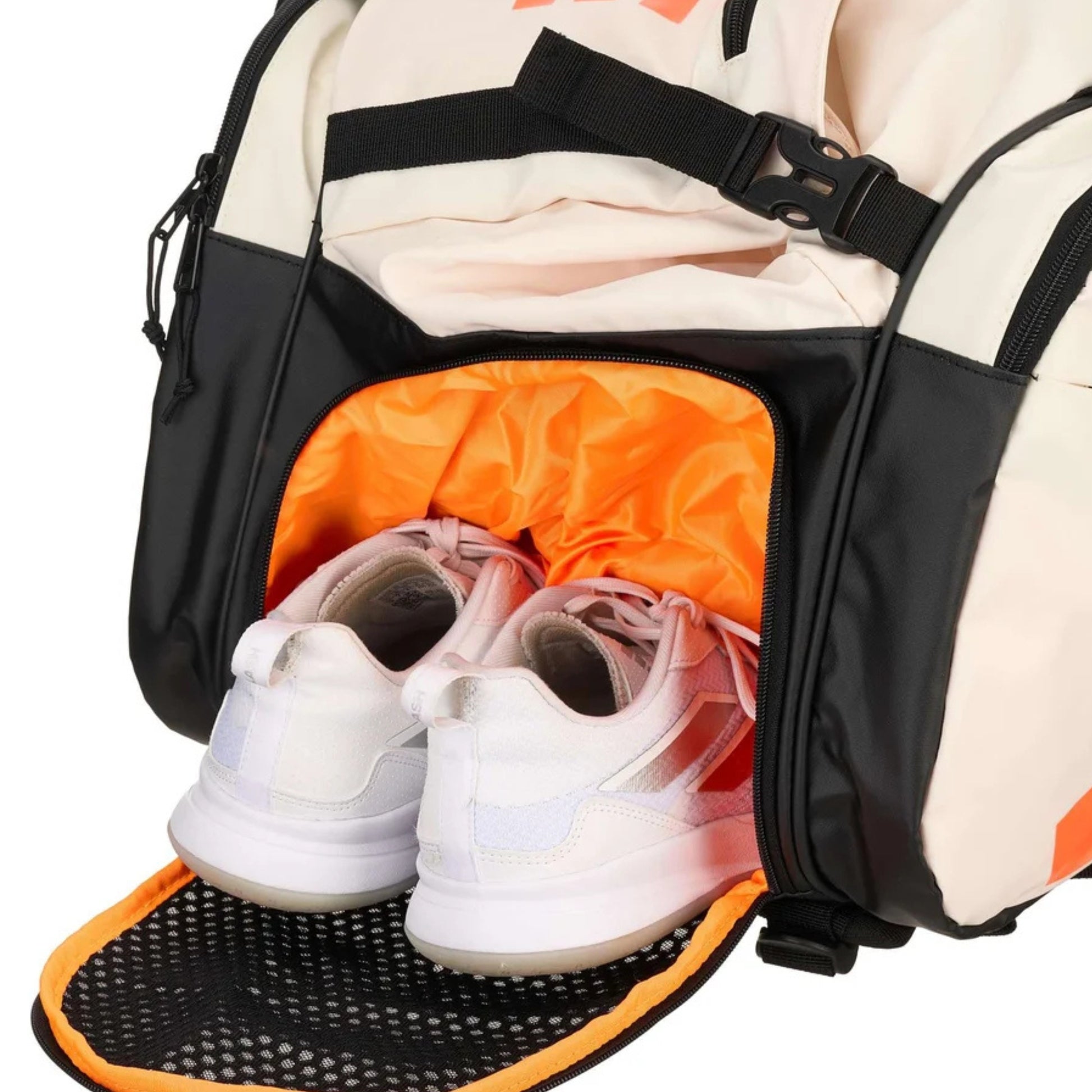 adidas tennis bag with orange interior showing white sneakers inside