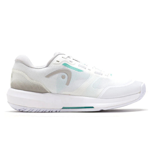 White Head tennis shoes with teal accents on a white background