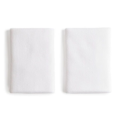 Two white wristbands, displayed side-by-side on a clean white background.