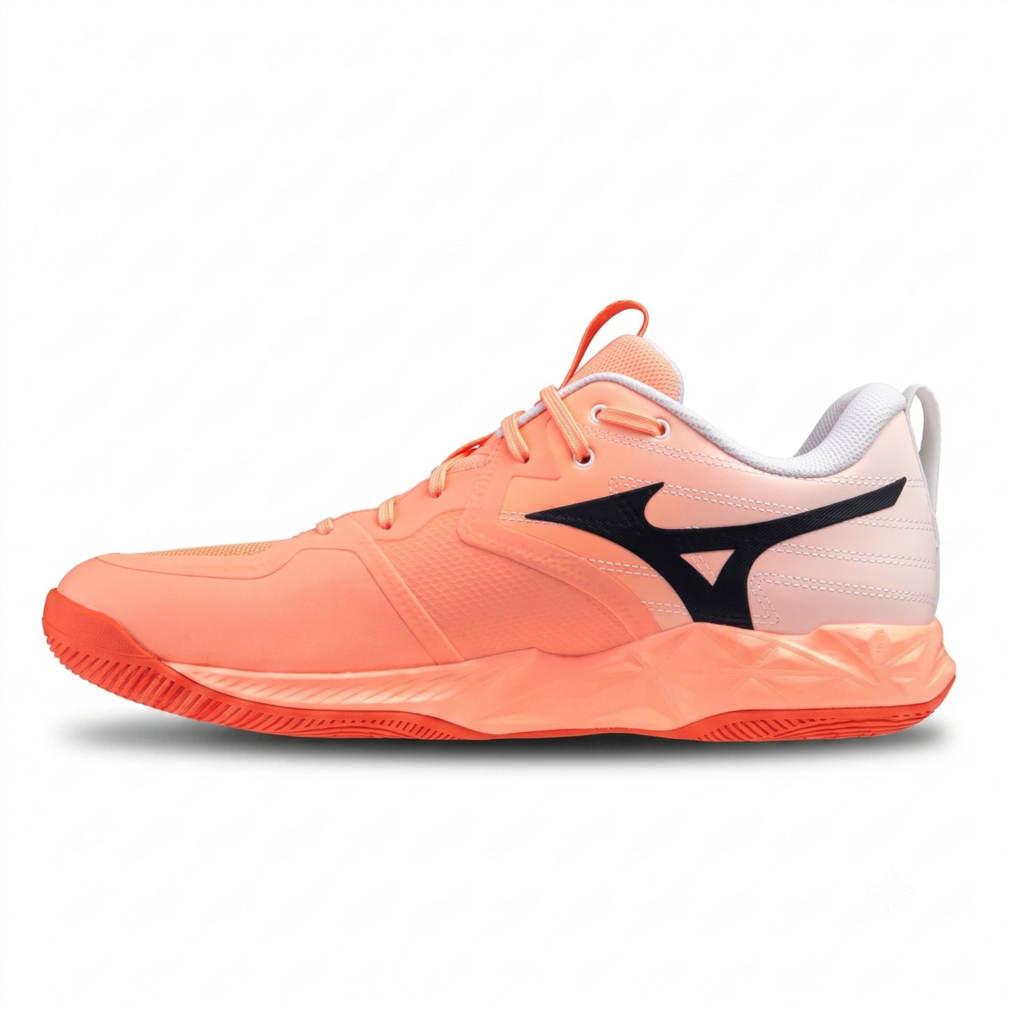 A single Mizuno squash shoe in a coral orange colorway, featuring a white and coral mesh upper, a black Mizuno wave logo on the side, and a thick sculpted coral midsole, shown against a plain white background.