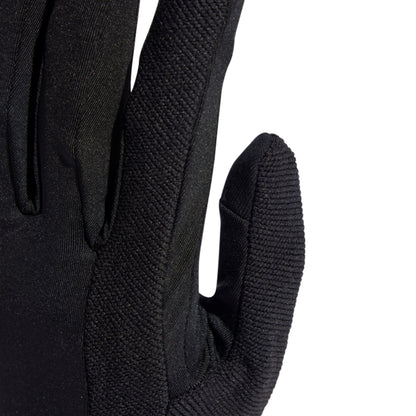 Close-up of a black glove on a white background