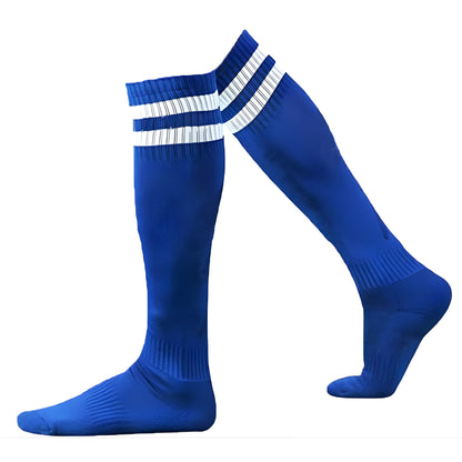 Pair of blue knee-high socks with white stripes on a white background