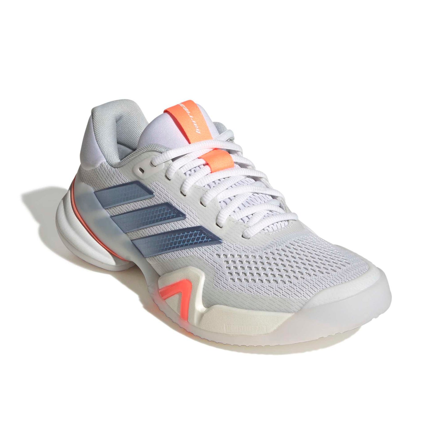 White adidas tennis shoe with blue and orange accents on a white background