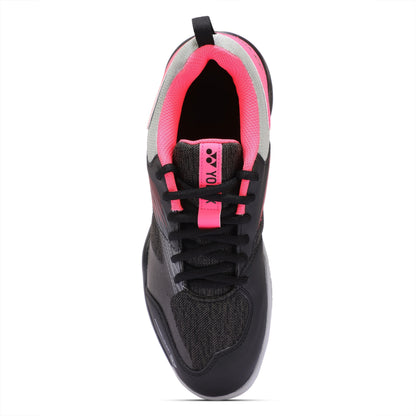 Black and pink Yonex shoe on a white background