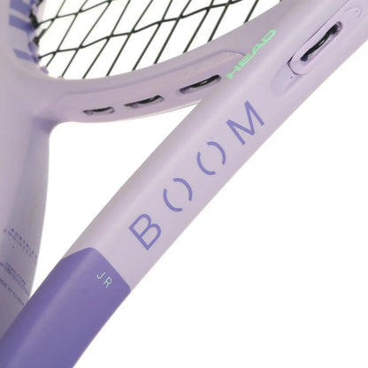 Close-up of a HEAD kids' tennis racket in pastel lavender purple, showing the BOOM series branding and the Junior (JR) model marking on the throat and grip.