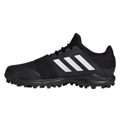 Black Adidas hockey shoe with white stripes on a white background