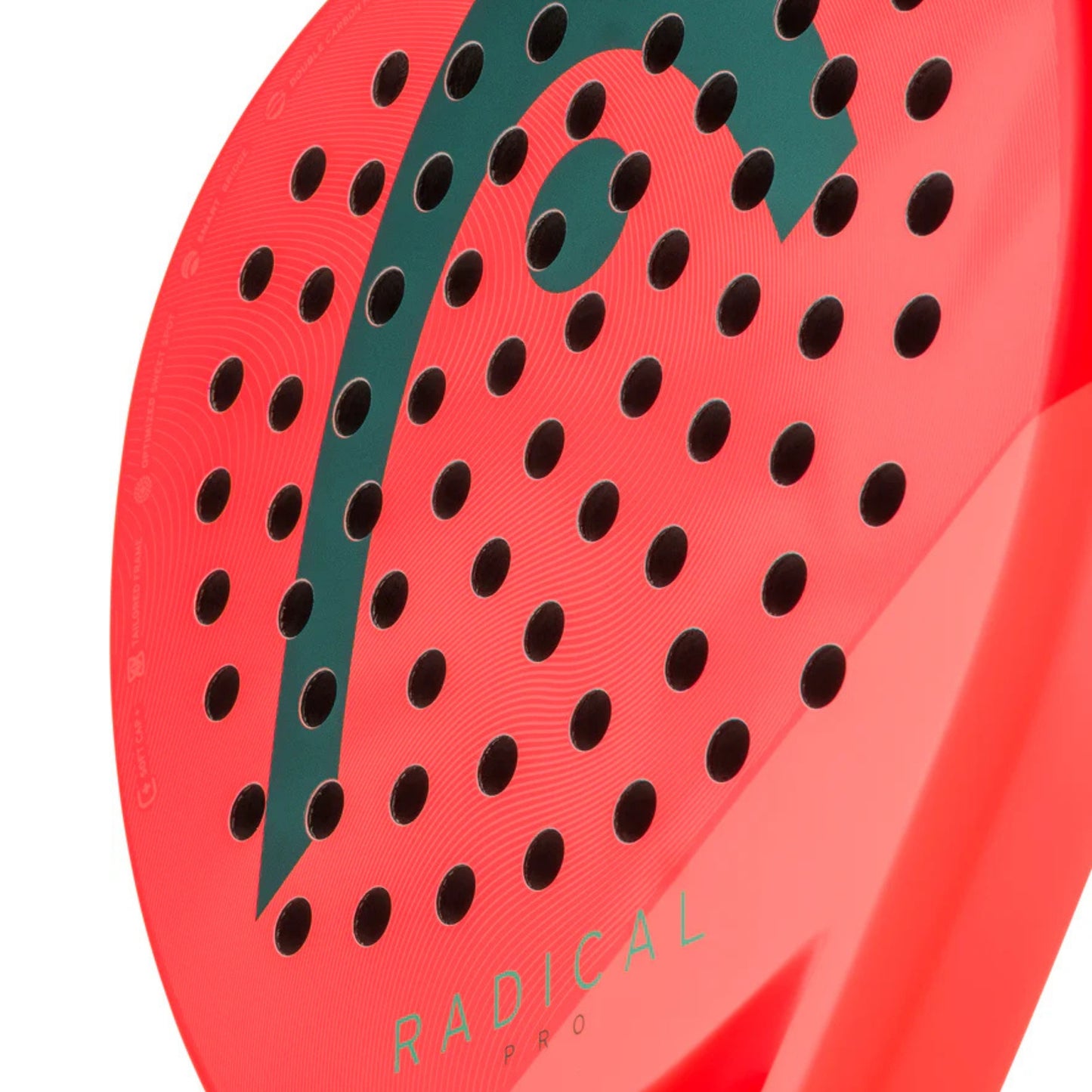 Close-up of a red Head padel racket with black dot pattern and 'Radical' branding on a white background