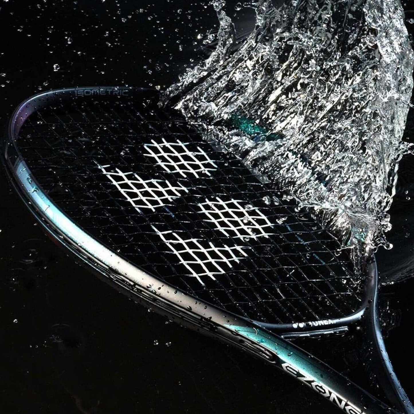 Tennis racket with water splashing onto it against a dark background