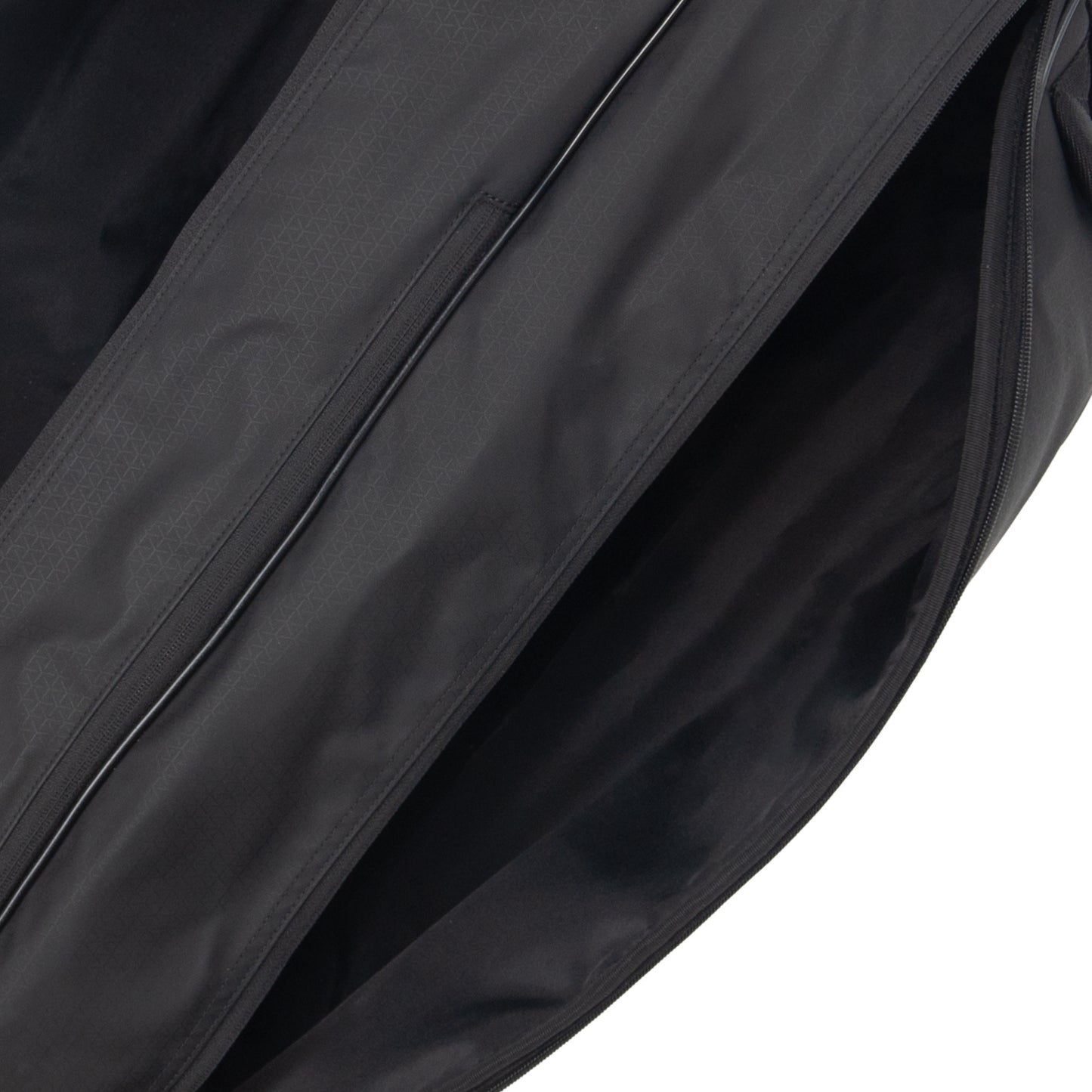 Close-up of a black tennis bag with a zipper