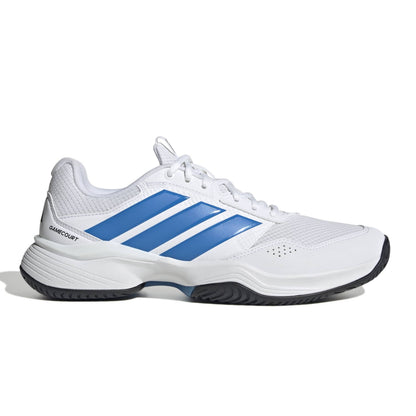 White adidas tennis shoe with blue a blue logo with a black sole on a white background.