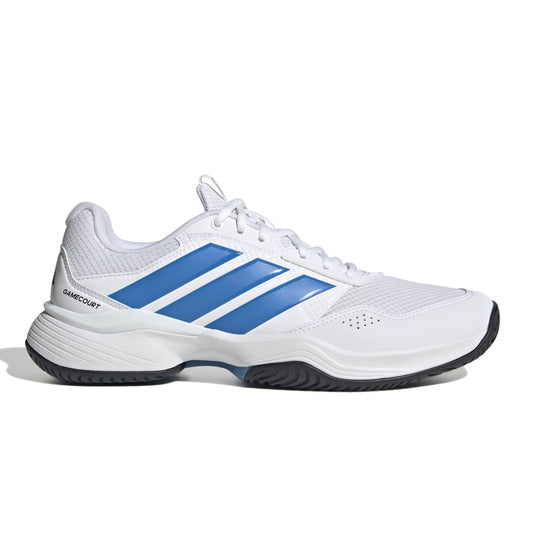 White adidas tennis shoe with blue a blue logo with a black sole on a white background.