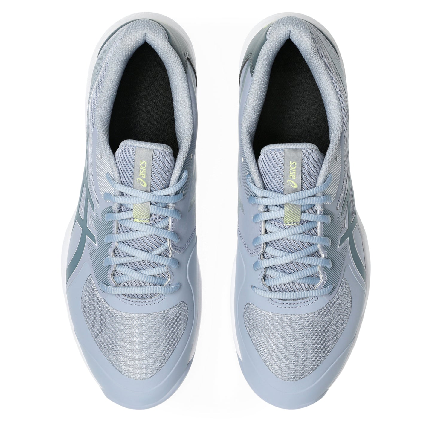 Pair of light gray tennis shoes on a white background